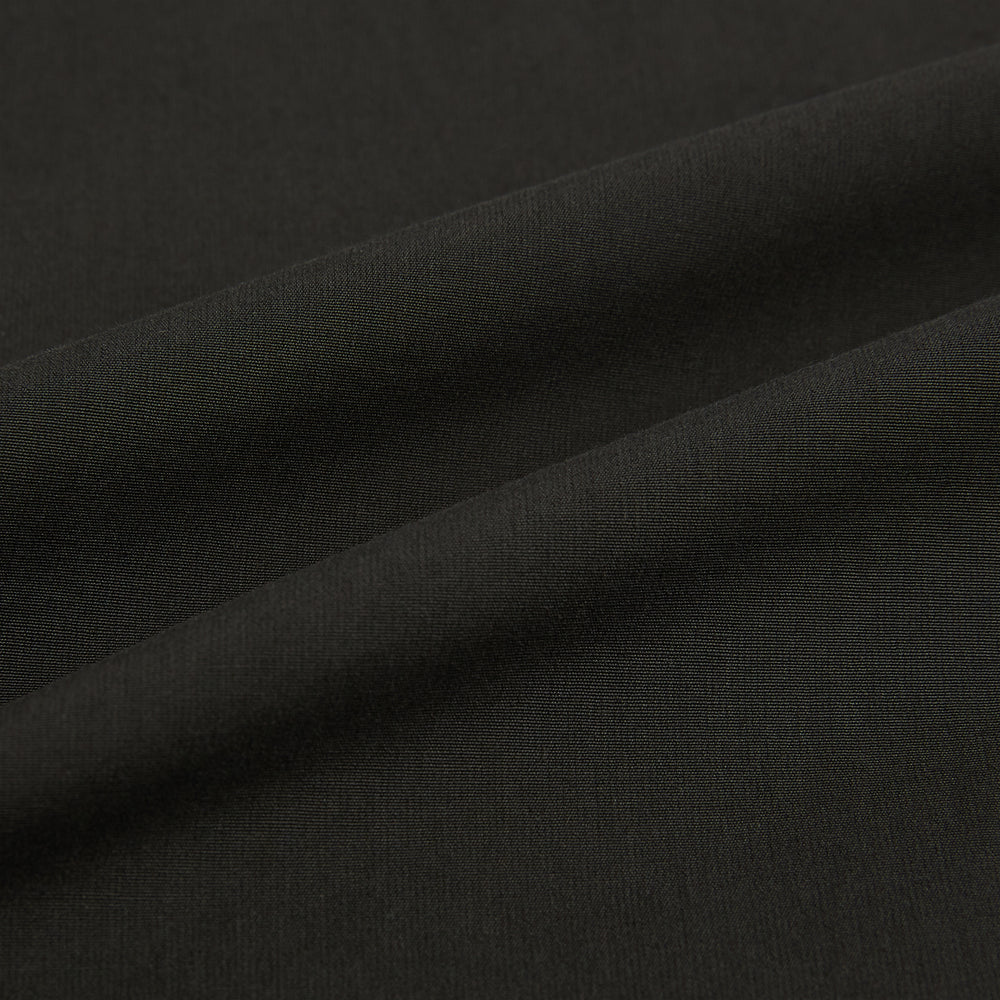 A brown Windsor long-sleeve button-up shirt by Turnbull & Asser with a classic collar, buttoned cuffs, and a straight hem, laid flat on a white background—showcasing refined British craftsmanship.