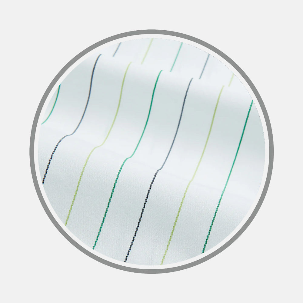 Close-up of Green Wide Pinstripe Fabric by Turnbull & Asser, featuring thin green, yellow, and black vertical stripes on white, displayed in a circular frame against a plain light gray background.