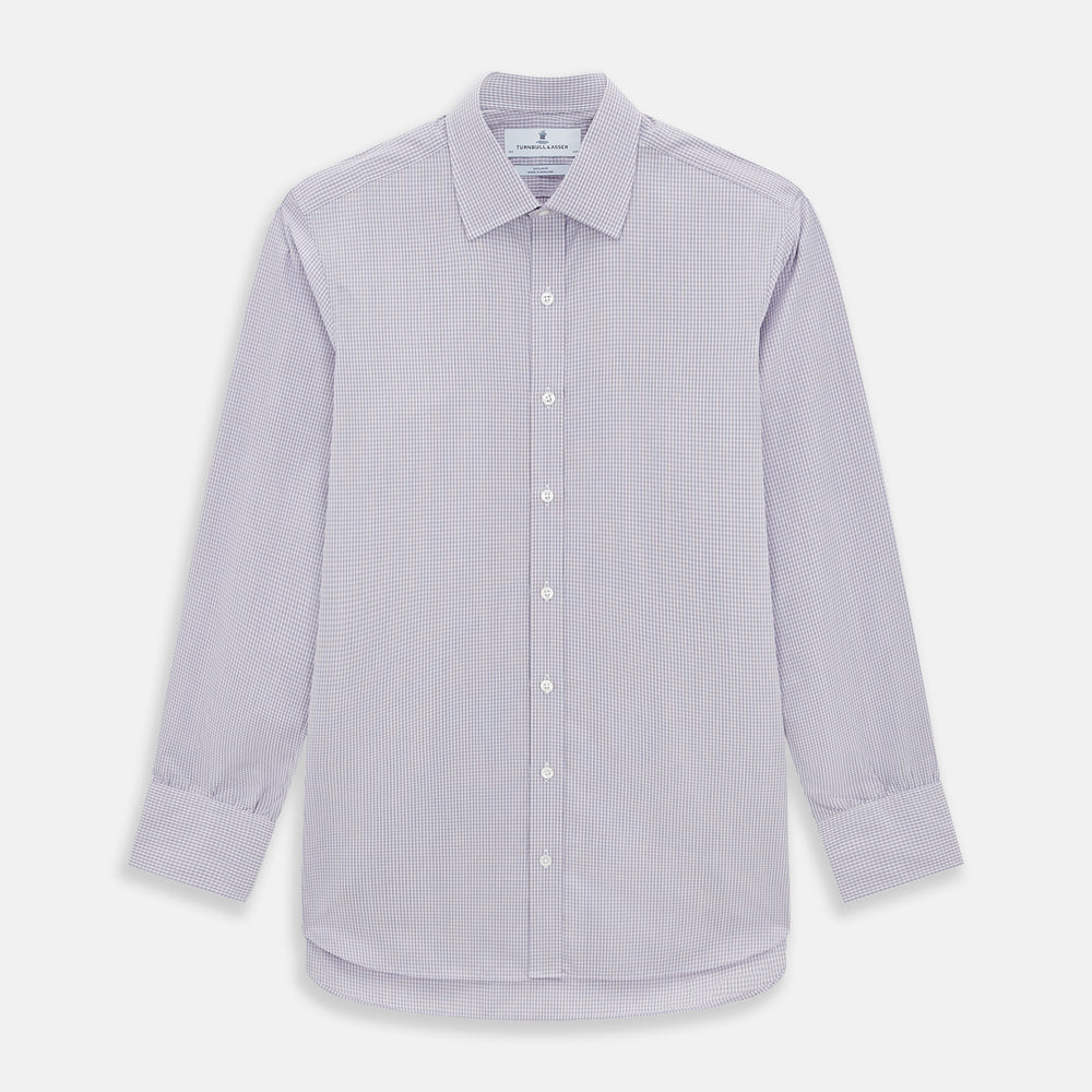 The Turnbull & Asser Purple Micro Check Mayfair Shirt features long sleeves, button-up front, pointed collar, and buttoned cuffs in a subtle lilac and white check, exemplifying British craftsmanship and displayed on a white background.