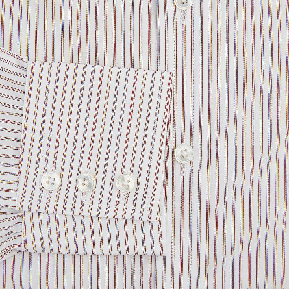The Red with Multicoloured Music Stripe Mayfair Shirt by Turnbull & Asser is a long-sleeve, button-up shirt with a collar, featuring vibrant multicoloured stripes, inspired by classic British design, neatly laid flat on a plain background.