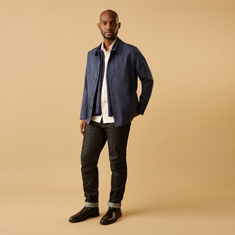 The Turnbull & Asser Cream Weekend Fit Hayne Shirt features a Dorset collar and 1-button cuffs, displayed long-sleeved and laid flat on a white background.