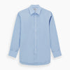 View 1 of product The Turnbull & Asser Blue Cotton Shirt features a T&A collar, 3-button cuffs, and white buttons—ideal for navy suits or smart looks. Laid flat on a white background.