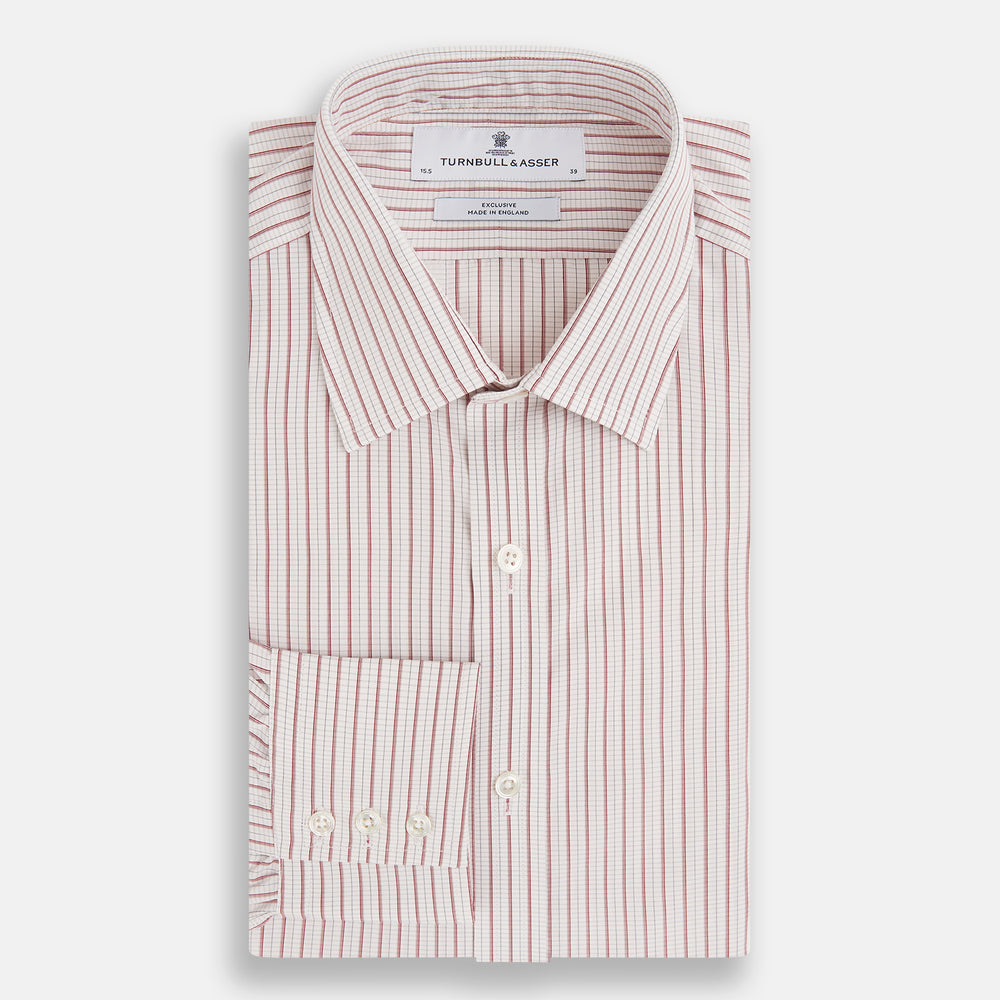 The Turnbull & Asser Red Graph Check Mayfair Shirt features a classic collar and buttoned cuffs, with red and blue stripes on white, ideal for formal wear. Laid flat on a white surface.