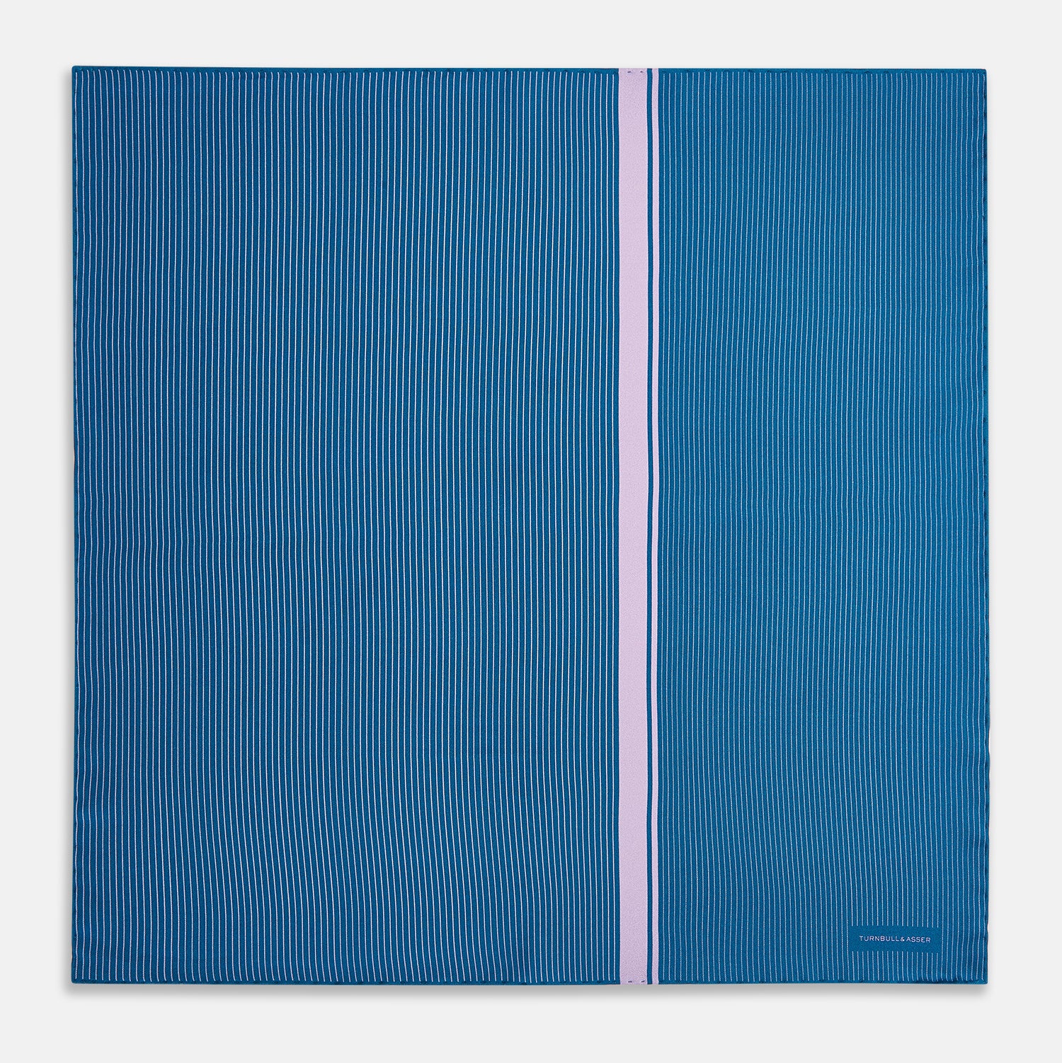 View 4 of product The Turnbull & Asser Blue and Lilac Stripe Silk Pocket Square features blue silk with white pinstripes, a bold lilac stripe near the edge, a turned-up corner revealing the reverse, and the brand name displayed in the bottom right.