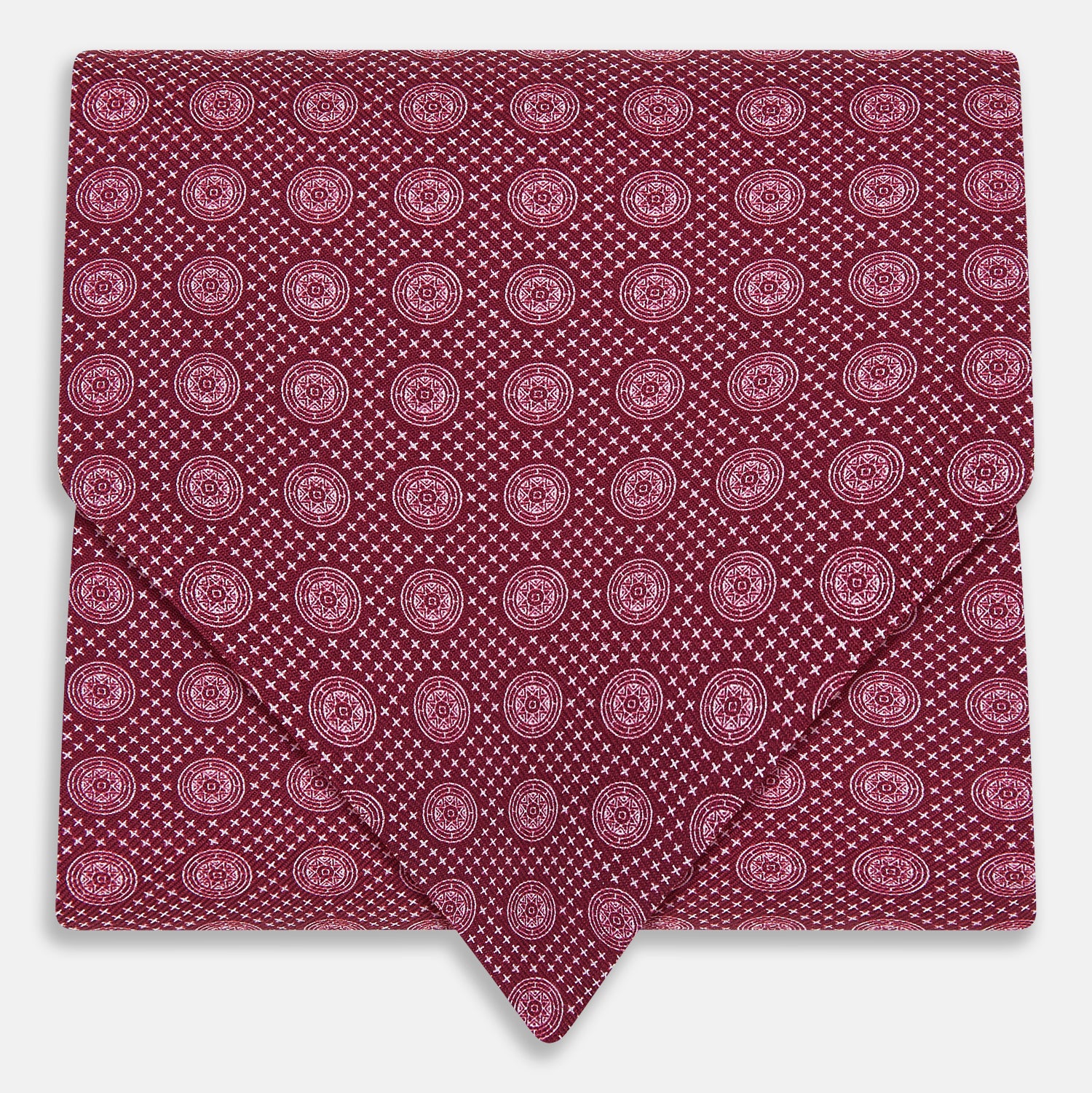 View 1 of product The Burgundy Medallion Silk Cravat by Turnbull & Asser features a white geometric medallion pattern, neatly crafted for an elegant accessory inspired by classic British style.
