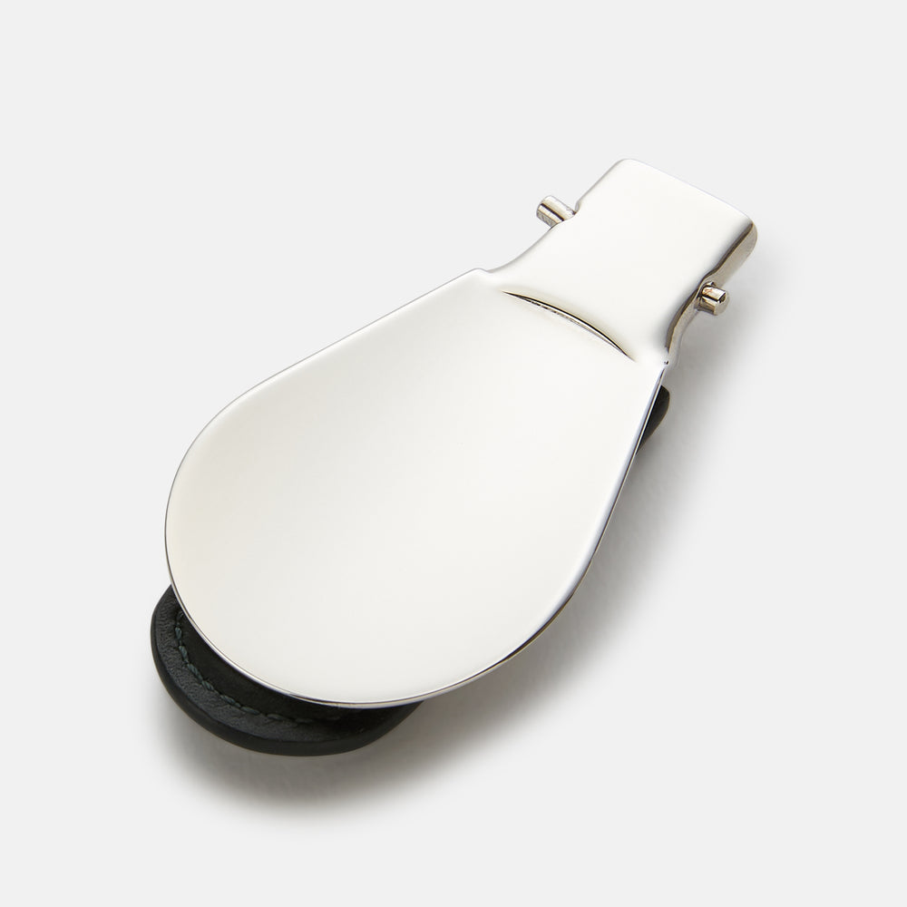 The Turnbull & Asser Forest Green Travel Shoe Horn features a wide, smooth metal blade and a forest green leather handle, shown against a plain white background.