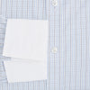 View 4 of product The Turnbull & Asser Pale Blue and Navy Grid Check Shirt features a contrast T&A collar and cuffs, long sleeves, and a button-down front, all displayed on a plain white background.