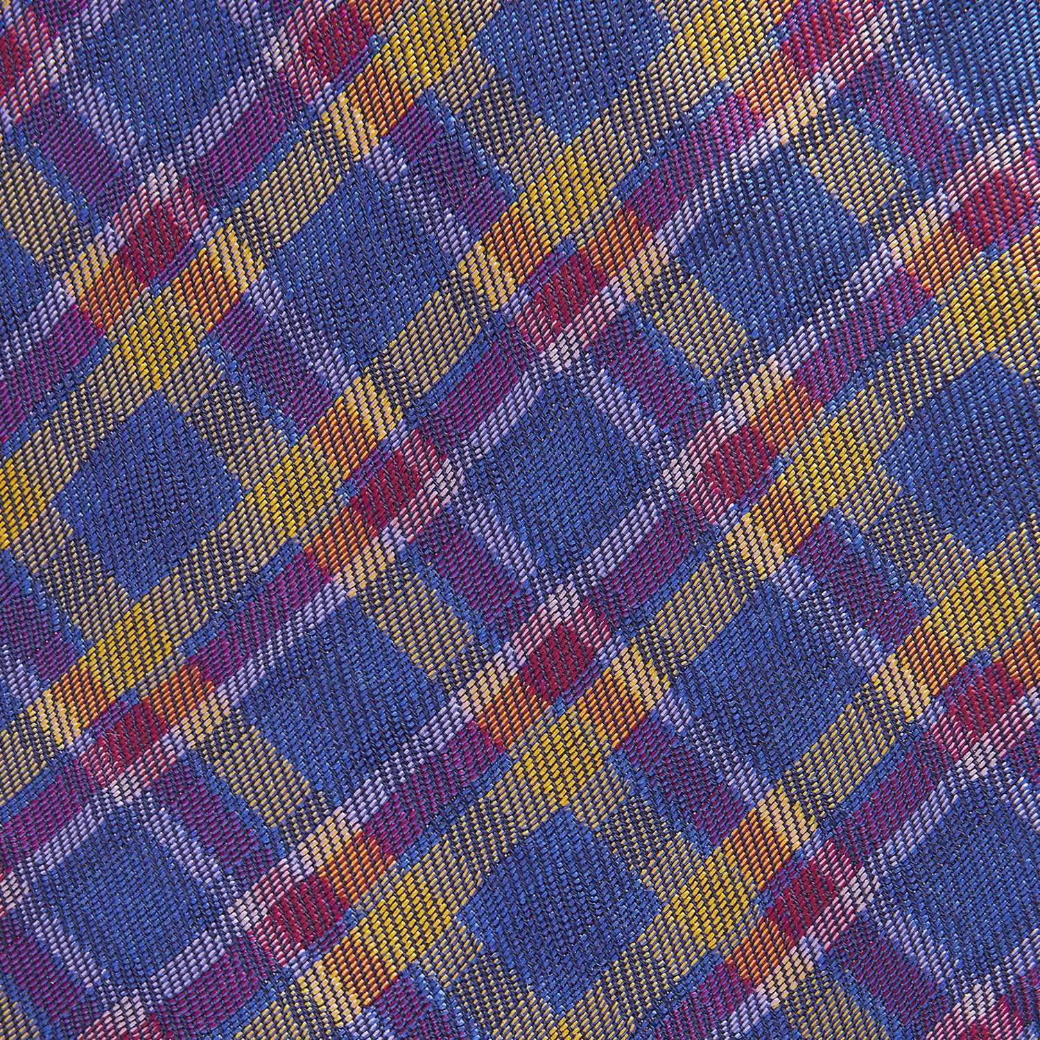 View 2 of product The Turnbull & Asser Blue Multi Tartan Silk Tie features a vibrant blue, yellow, and pink plaid pattern and is shown rolled up on a white background.