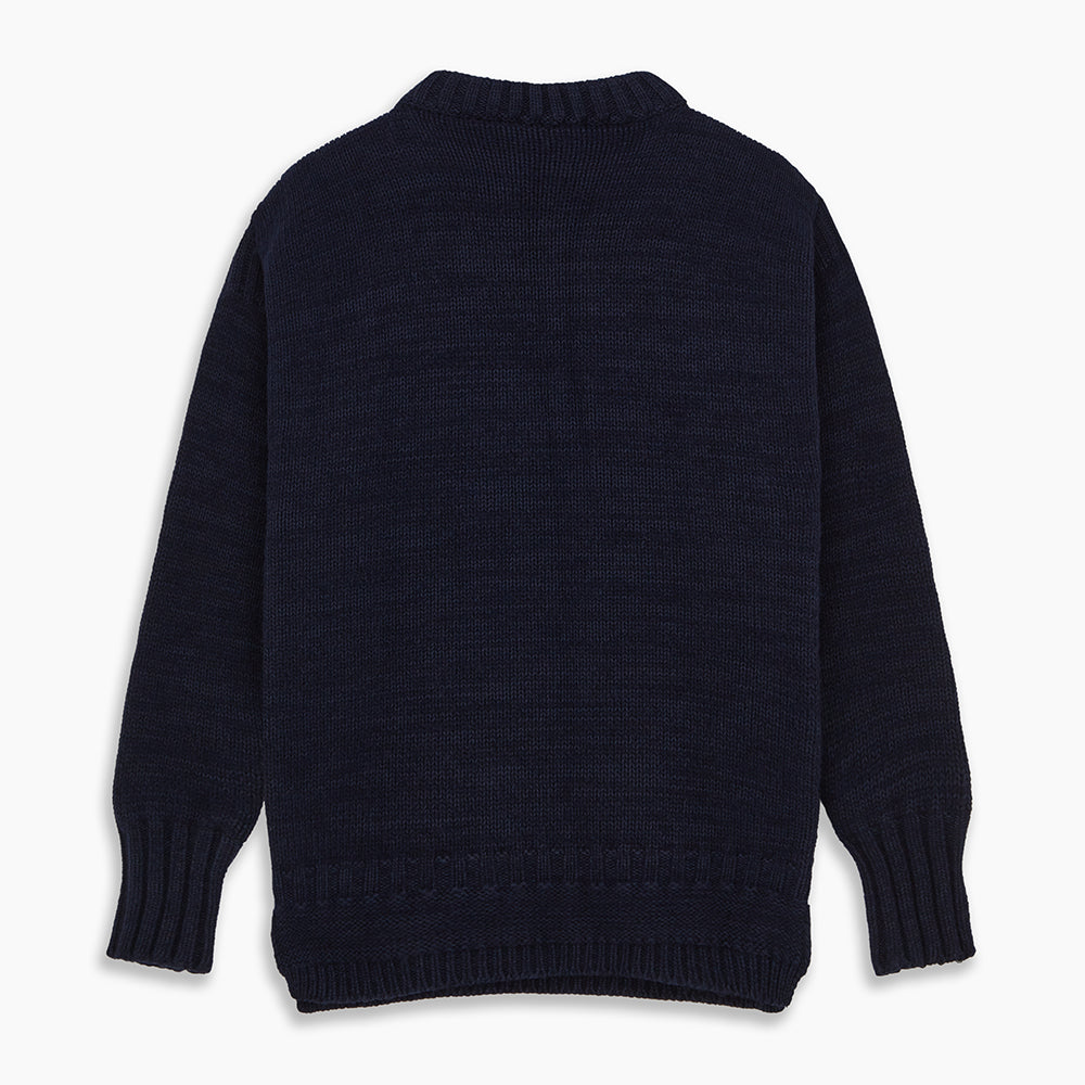 The Turnbull & Asser Navy Wool and Cotton Blend Albany Guernsey Jumper, shown flat on a white background, features long sleeves, a classic cable knit pattern on the upper half, and ribbed cuffs, hem, and collar.