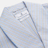 View 2 of product The Turnbull & Asser Blue and Yellow Check Poplin Cotton Dressing Gown features long sleeves, a shawl collar, front pockets, and a matching belt at the waist, shown on a plain white background.