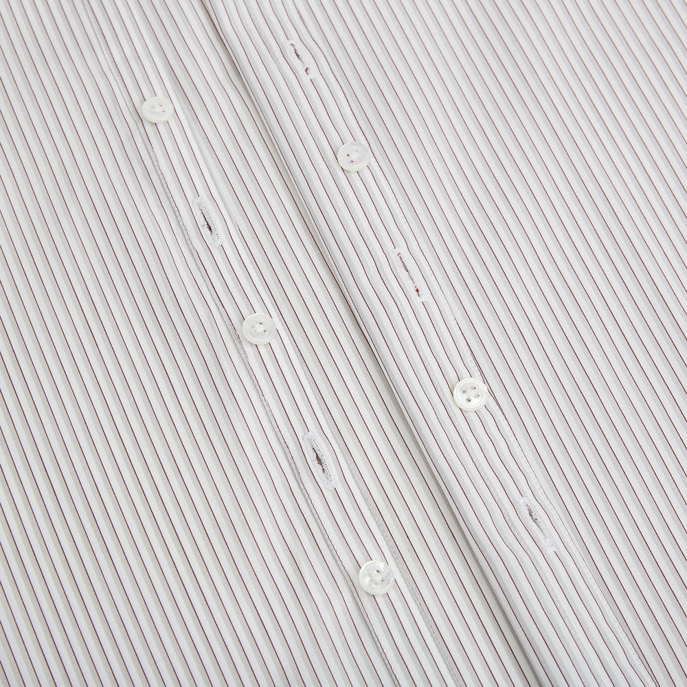 The Coffee and Grey Shadow Pinstripe Westminster Shirt by Turnbull & Asser features thin white and gray stripes, a long sleeve, button-down style, and signature collar, all reflecting classic British craftsmanship.