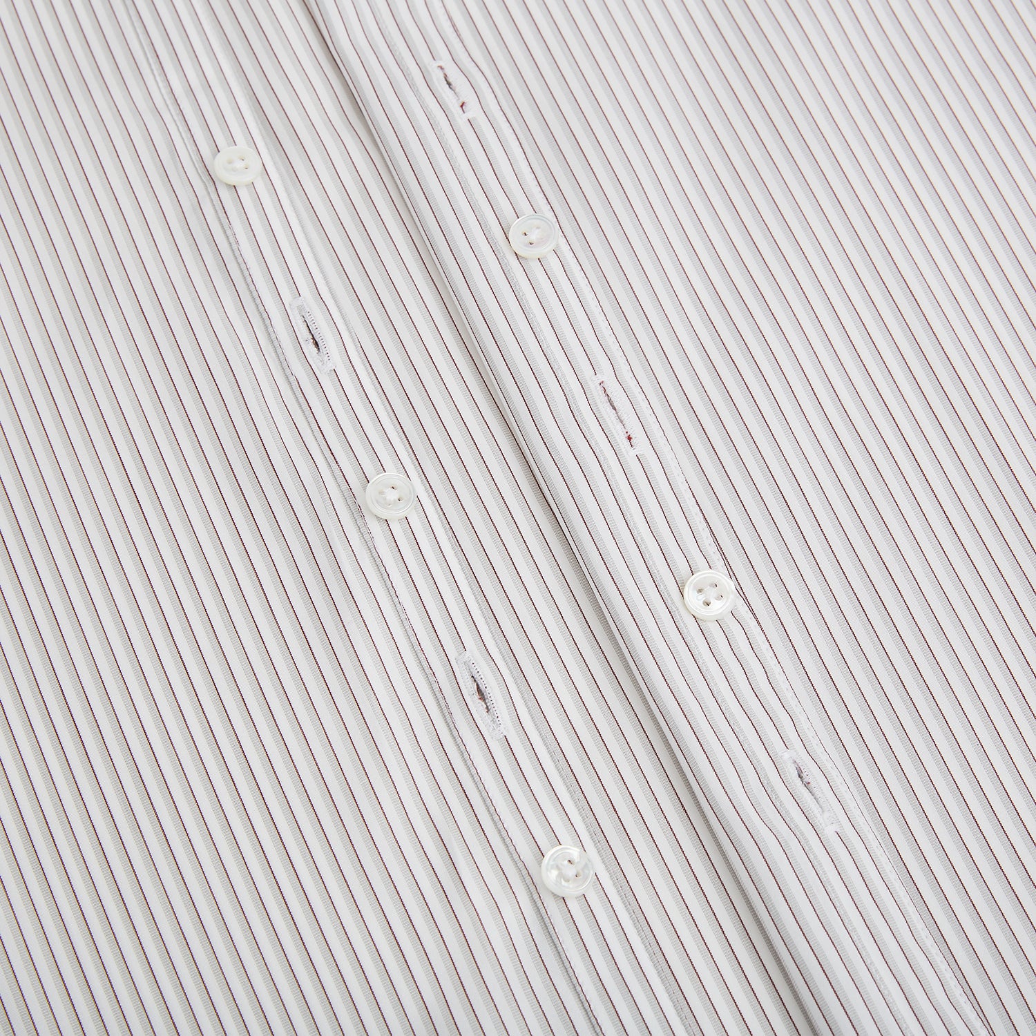 View 7 of product The Coffee and Grey Shadow Pinstripe Westminster Shirt by Turnbull & Asser features thin white and gray stripes, a long sleeve, button-down style, and signature collar, all reflecting classic British craftsmanship.