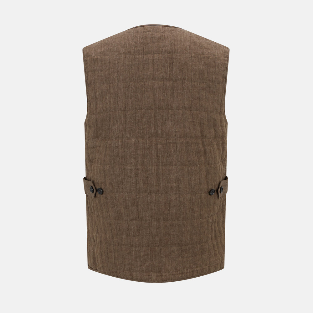 The Turnbull & Asser Pine Cone Quilted Linen Herringbone Waistcoat features a brown, sleeveless design with dark buttons, two angled side pockets, and a chest pocket, shown on a plain white background.