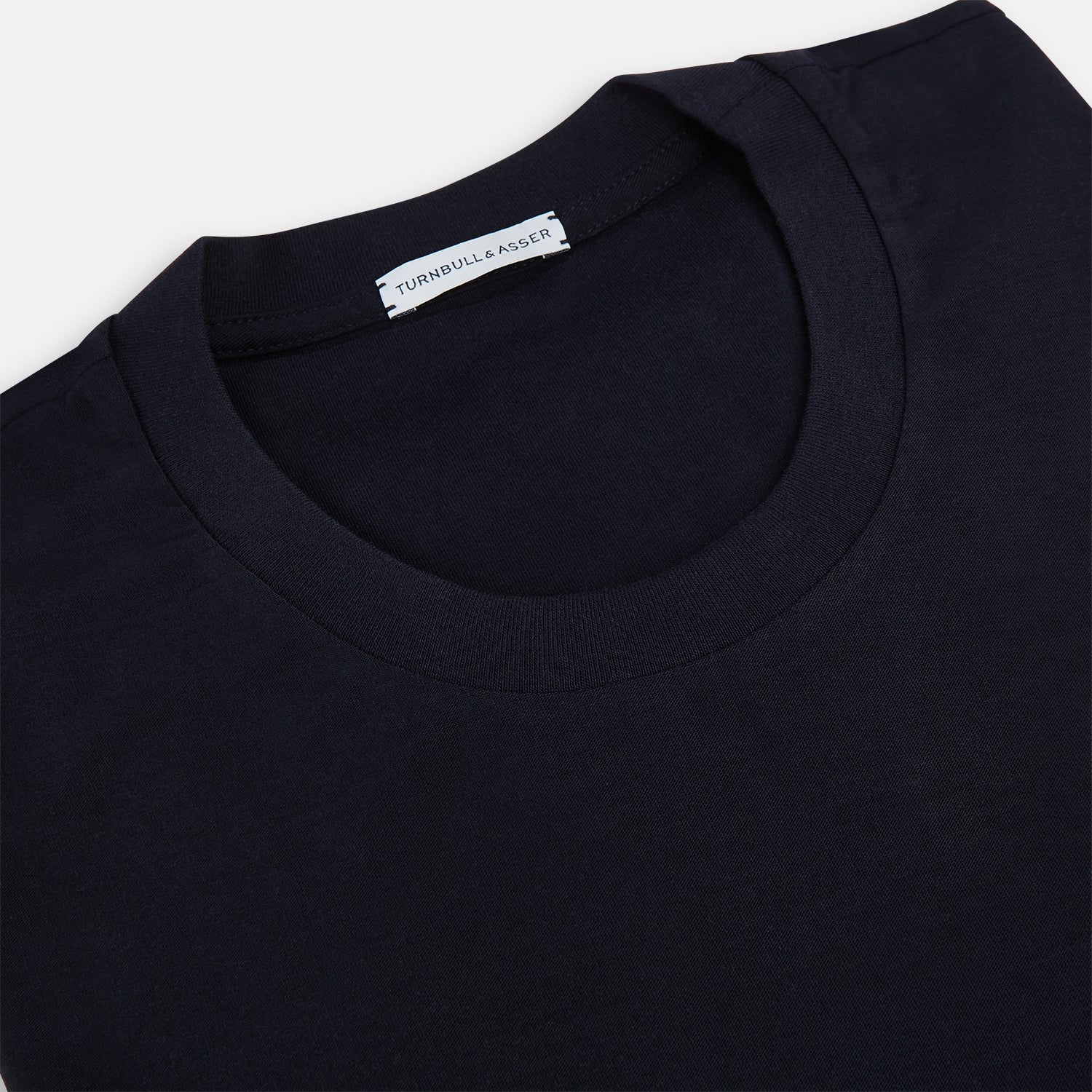 View 2 of product The Turnbull & Asser Navy Short-sleeve Fitted T-Shirt, featuring a simple crew neckline and no visible logos or designs, is shown from the front on a white background—ideal for smart casual looks.