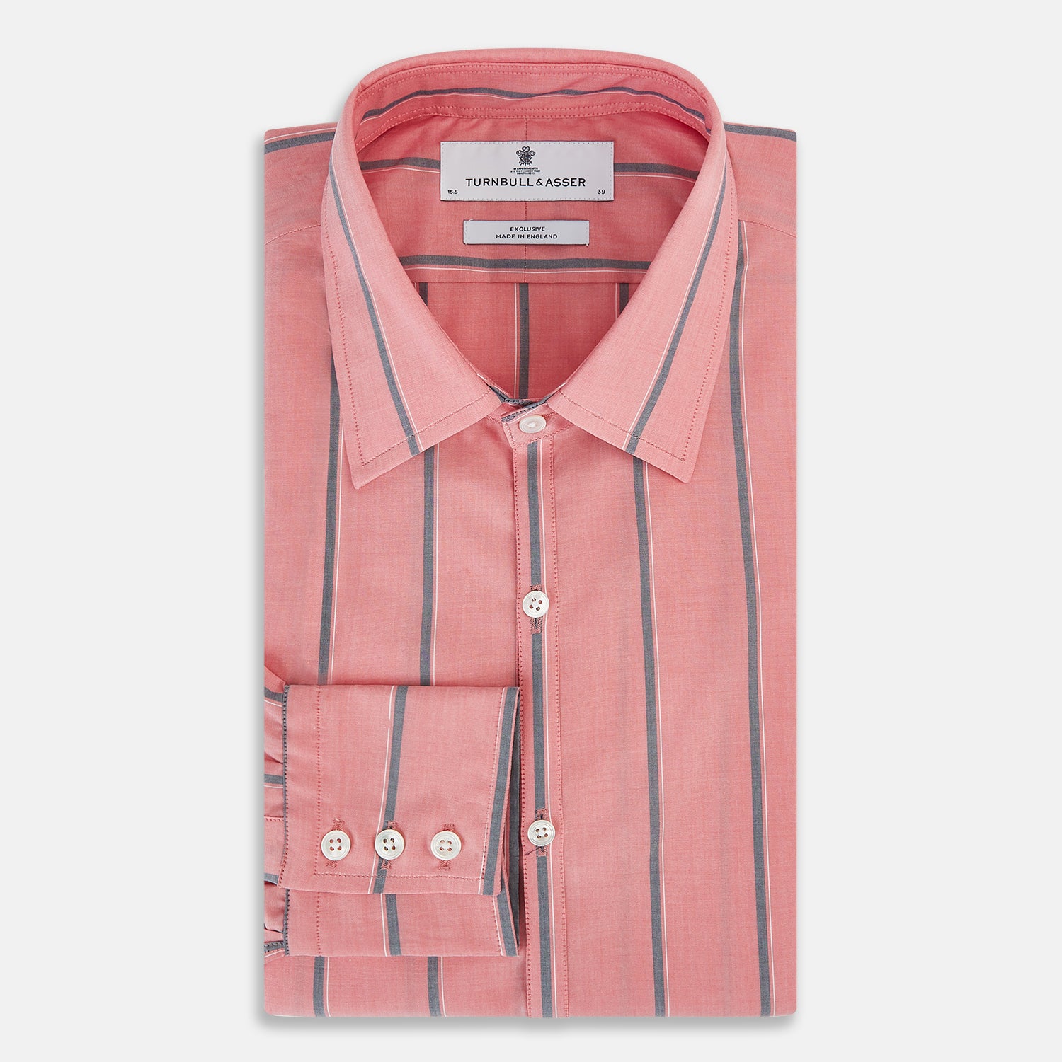 View 5 of product The Coral Pink Track Stripe Westminster Shirt by Turnbull & Asser features vertical navy and white stripes, a tailored fit, pointed collar, and buttoned cuffs—is displayed laid flat on a white background.