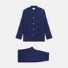 View 1 of product The Turnbull & Asser Blue and Navy Candy Stripe Silk Hyde Pyjamas Set features a long-sleeve button-up top with a chest pocket and elastic-waist pants, shown on a plain white background.