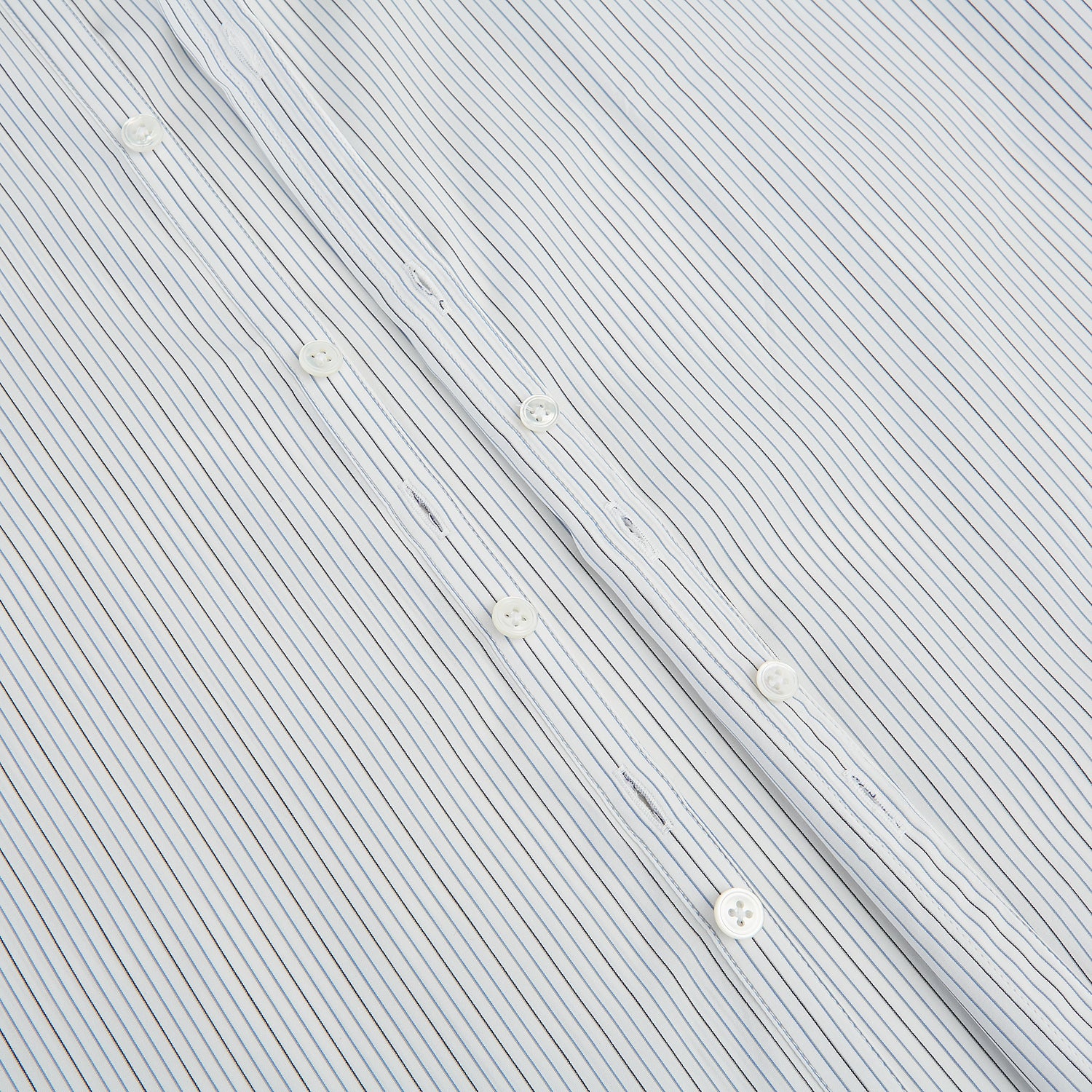 View 7 of product The Turnbull & Asser Grey and Blue Pinstripe Westminster Shirt features fine stripes, a classic collar, and buttoned cuffs—showcasing signature British craftsmanship against a plain white backdrop.