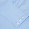 View 3 of product A Light Blue Cotton Shirt with a T&A collar and 3-button cuffs by Turnbull & Asser is displayed on a plain white background, ideal for pairing with a navy suit.