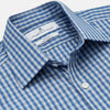View 2 of product The Turnbull & Asser Navy Multi Check Cotton Regular Fit Mayfair Shirt features long sleeves, button-down front, collar, and buttoned cuffs in a navy and white check pattern, shown against a plain white background.