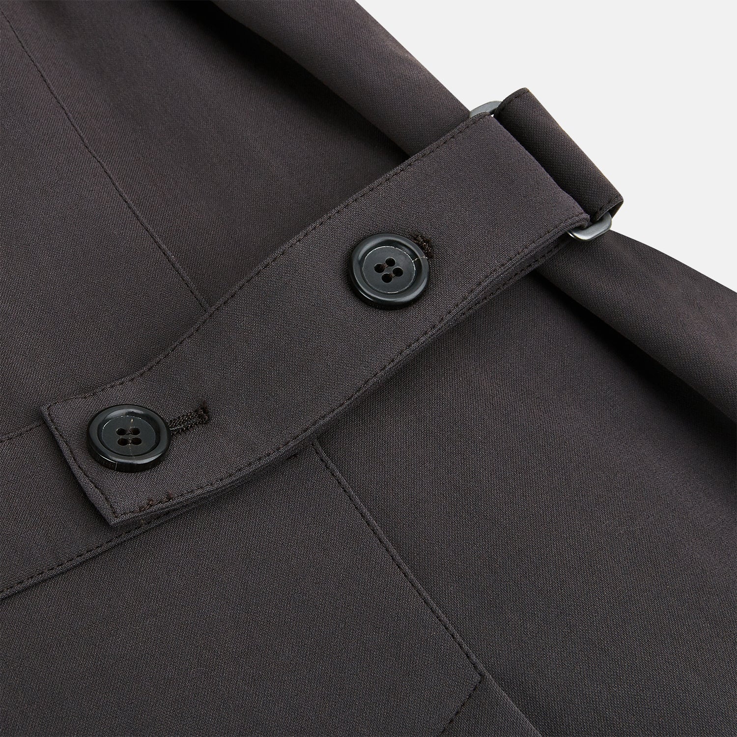 View 5 of product The Dark Chocolate John Arthur Trench Coat by Turnbull & Asser features a pointed collar, two large slanted side pockets, and a vertical chest pocket—a versatile 2-in-1 piece ideal for any occasion.