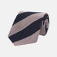 The Turnbull & Asser Navy and Rose Block Stripe Repp Silk Tie, crafted from luxurious silk, features bold diagonal stripes and is displayed rolled up on a plain white background.