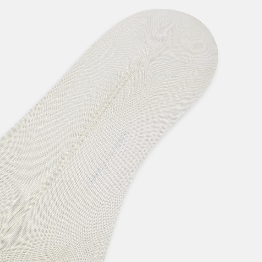 A single Turnbull & Asser Vanilla Silk Long Sock, knee-high and displayed upright, on a plain white background.
