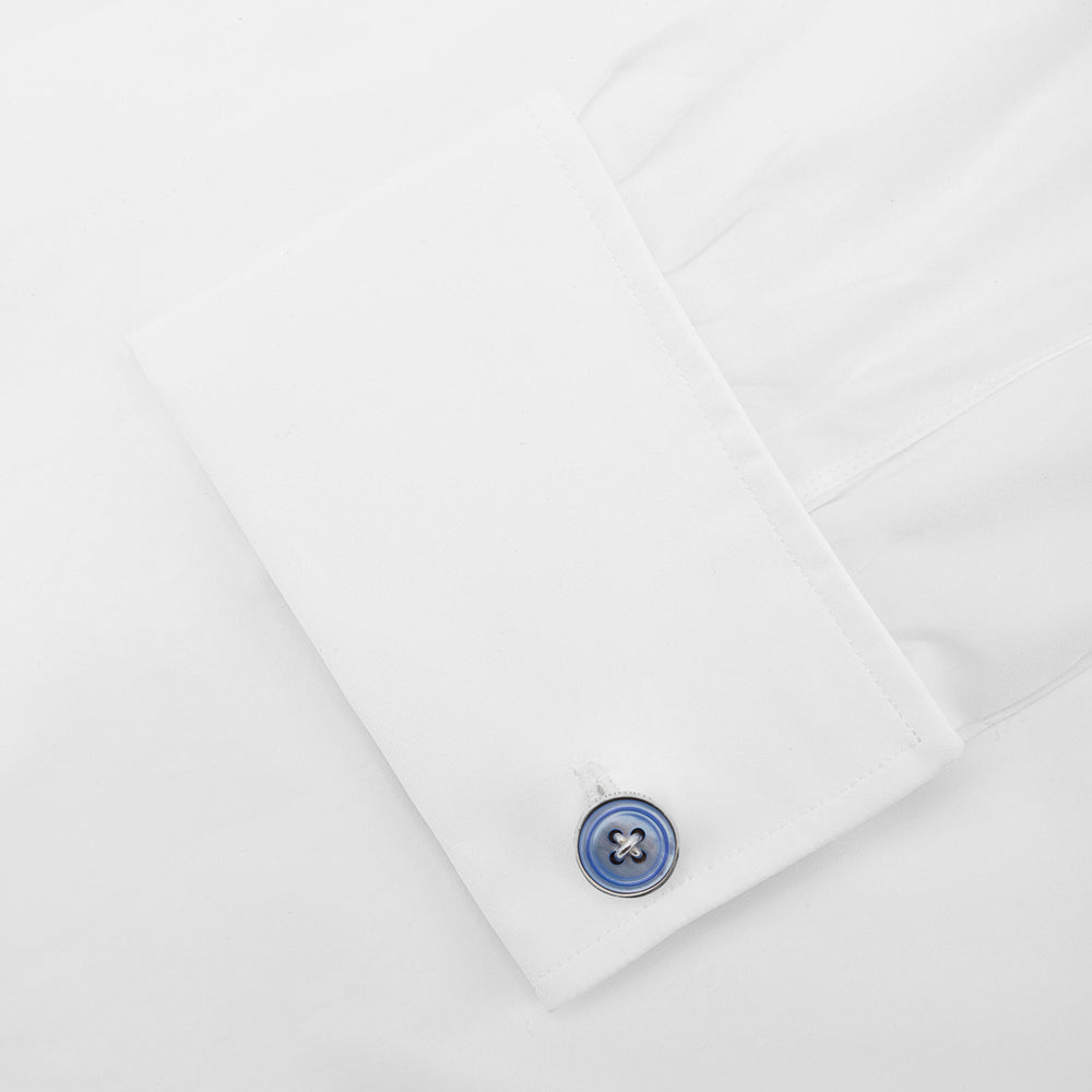 Turnbull & Asser’s Purple Sterling Silver Mother-of-Pearl Button Cufflinks feature round, purple button-shaped faces with four central holes, lending a touch of British eccentricity against a plain white background.