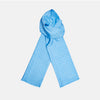 View 1 of product The Turnbull & Asser Azure and White Spotted Silk Scarf features small white polka dots, subtle fringe at the ends, and a delicate hand-printed design, displayed on a plain white background.