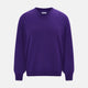 The Turnbull & Asser Purple Merino V-Neck Jumper features long sleeves and a rich, solid hue, making it an essential knitwear piece for any wardrobe.