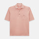 The Orange Polo Shirt by Turnbull & Asser features short sleeves, a collar, three-button placket, and a small buttoned chest pocket in soft cotton jersey—timeless men's style laid flat on a white background.