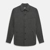 View 1 of product The Charcoal Melange Hampstead overshirt by Turnbull & Asser is a dark gray long-sleeve button-up with a collar, left chest pocket, and two zippered side pockets, shown laid flat on a white background.