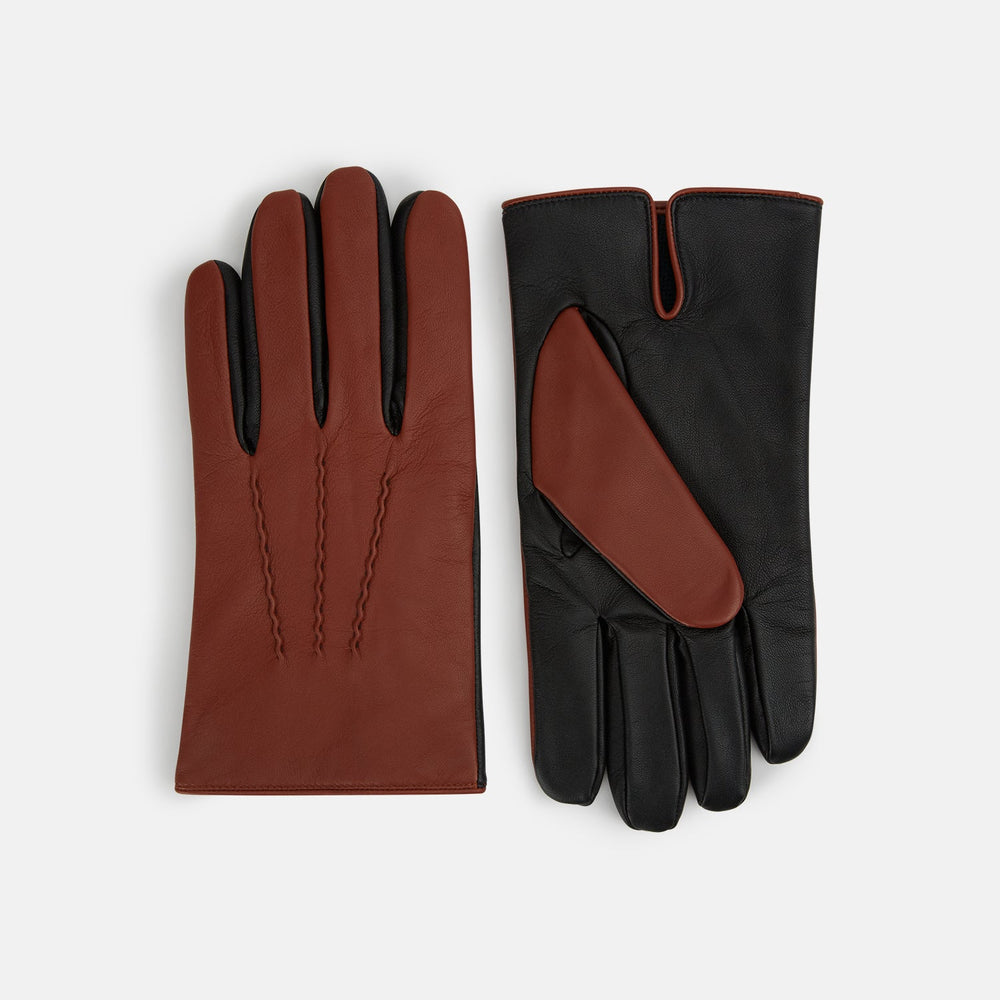 Turnbull & Asser Brown/Ebony Cashmere-Lined Hairsheep Leather Touchscreen Gloves are shown front and back, featuring a brown outer with subtle stitching and black palms/fingers accented with brown at the thumb and wrist.