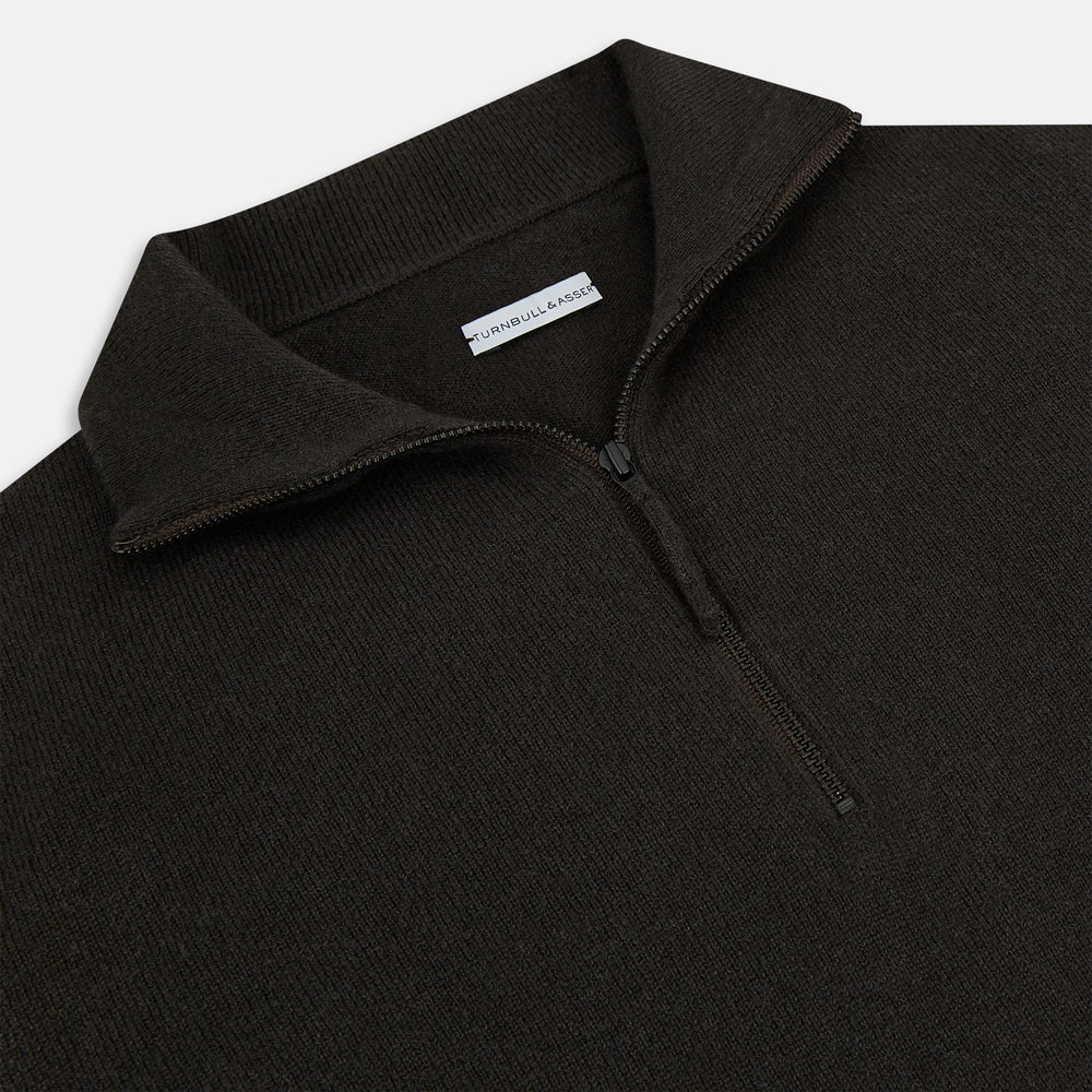 The Turnbull & Asser Brown Half-Zip Cashmere Jumper features a plain, long-sleeve design with a high collar and quarter-zip neckline, showcased against a white background.