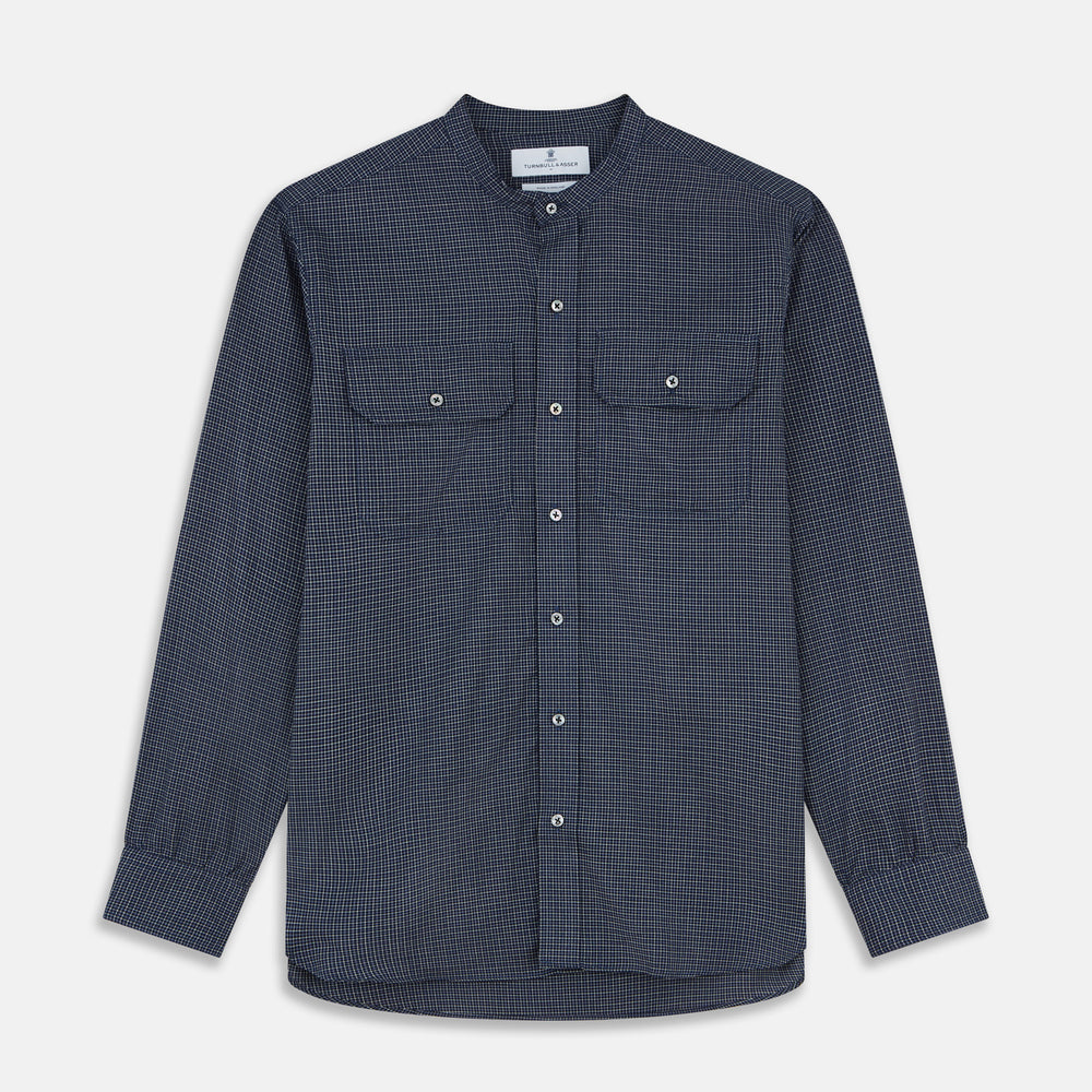 The Turnbull & Asser Navy Check Weekend Fit Flannel Shirt features a stand collar, button front, two chest pockets with flaps, and 1-button cuffs, crafted from soft Italian cotton and shown laid flat on a white background.
