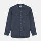 The Turnbull & Asser Navy Check Weekend Fit Flannel Shirt features a stand collar, button front, two chest pockets with flaps, and 1-button cuffs, crafted from soft Italian cotton and shown laid flat on a white background.