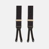 View 1 of product Turnbull & Asser Black Adjustable Formal Braces featuring leather ends and beige metal adjusters, made in England, shown on a white background.