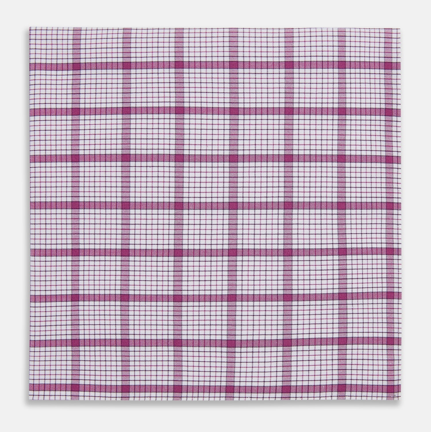 View 1 of product The Turnbull & Asser Hand Rolled Purple Graph Overlay Check Handkerchief is a white cotton accessory featuring intersecting purple and pink lines that create evenly spaced squares across the fabric.