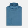 View 4 of product Turnbull & Asser's Pale Blue Fine Merino High Neck Jumper is shown on a plain white background, featuring a simple, classic design with long sleeves and no visible patterns or embellishments.