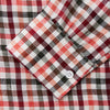 View 3 of product The Turnbull & Asser Red and Green Check Linen Blend Weekend Fit Hayne Shirt features a classic plaid pattern in red, white, black, and green, with a Dorset button-down collar and long sleeves. Displayed on a white background.