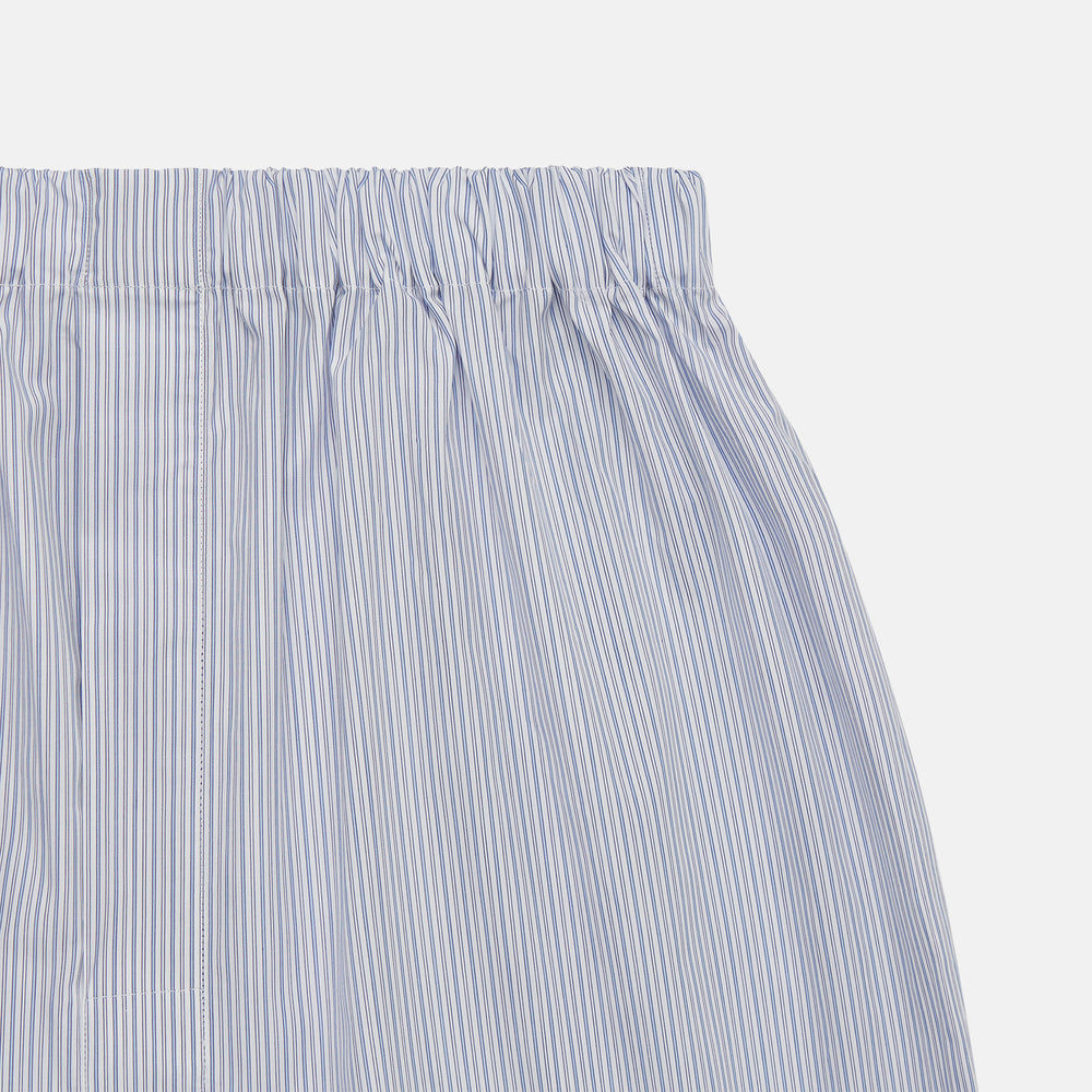 Turnbull & Asser Blue Multi Stripe Cotton Godfrey Boxer Shorts feature light blue and white stripes, an elastic waistband, and soft cotton fabric—perfect for those who value luxury underwear. Laid flat on a plain white background.