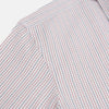 View 6 of product The Turnbull & Asser Red and Navy Check Windsor Shirt features a pointed collar and cuffed long sleeves, highlighting British craftsmanship. Displayed flat on a white background.