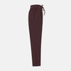 View 4 of product Turnbull & Asser Burgundy Corduroy Miles Trousers: high-waisted, straight-leg pants with an elasticated drawstring waist, shown on a white background.