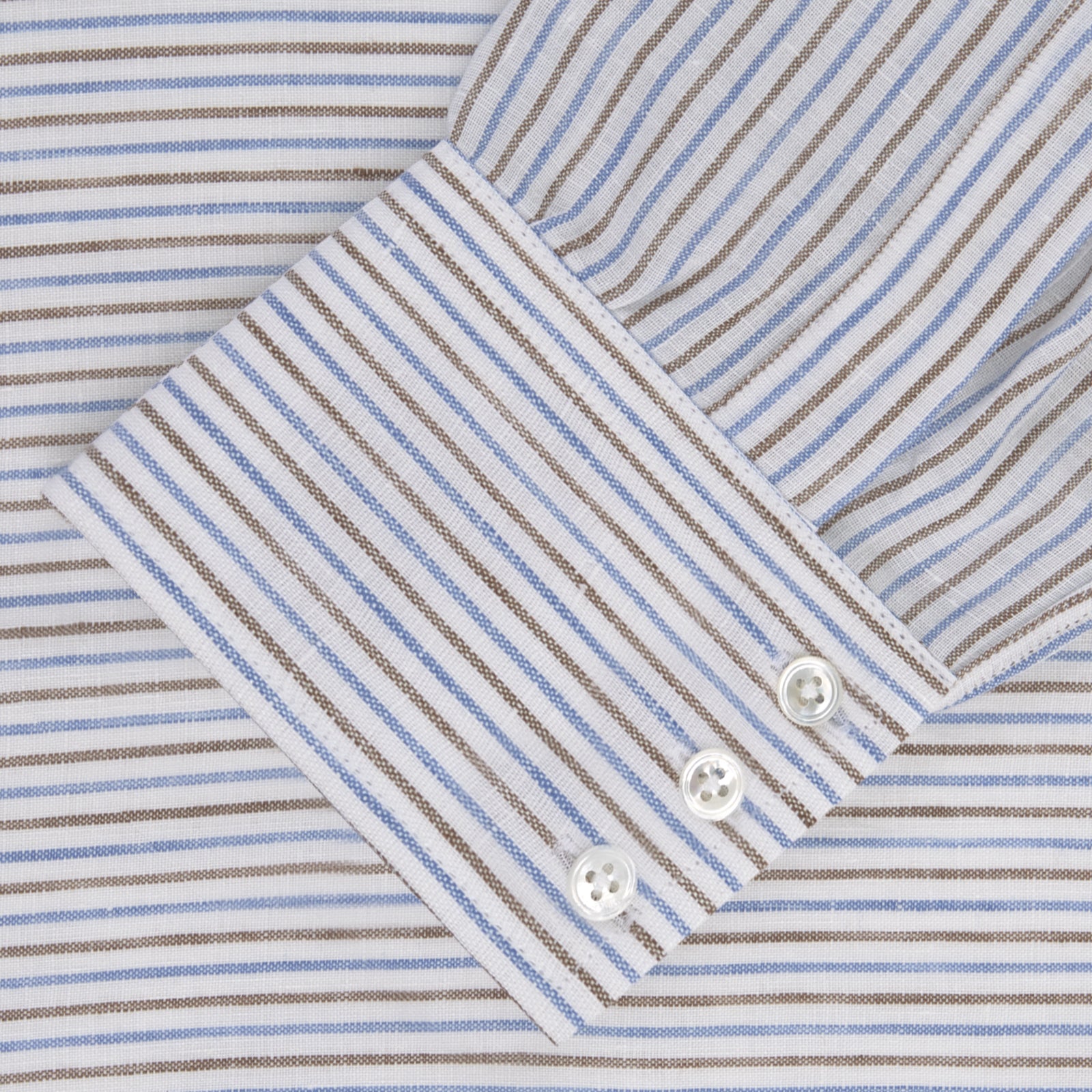 View 2 of product The Turnbull & Asser Brown and Blue Ticking Stripe Linen Shirt features a POW collar and 3-button cuffs, displayed against a light gray surface.