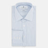 View 5 of product The Turnbull & Asser Sky Blue Hairline Multi Stripe Mayfair Shirt features Italian cotton, long sleeves, a classic collar, white buttons, and a subtle stripe pattern, shown on a plain white background.