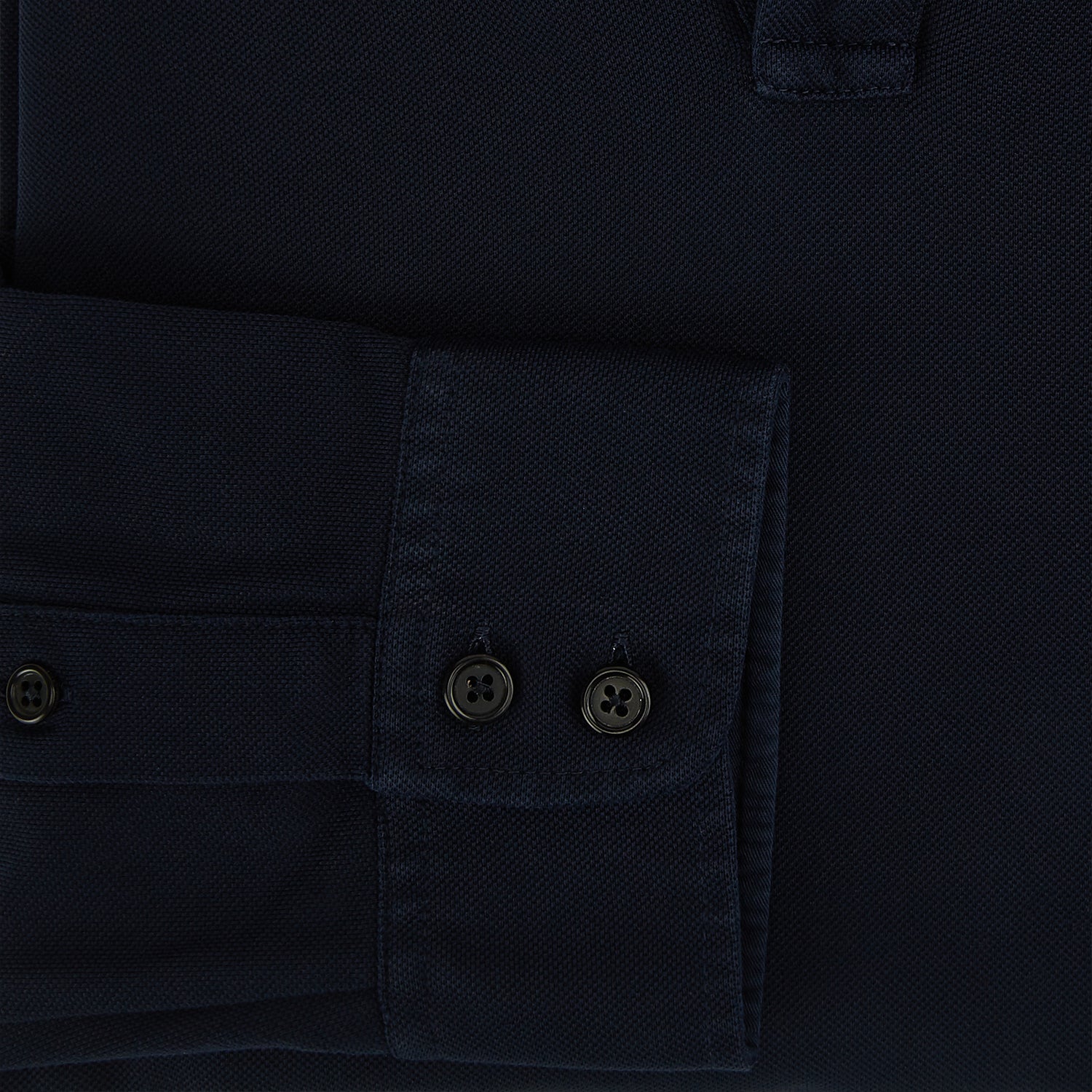 View 4 of product A Navy Rugby Polo Shirt by Turnbull & Asser, featuring long sleeves and a collar, is displayed flat on a white background. The design is simple and free of visible logos or patterns.