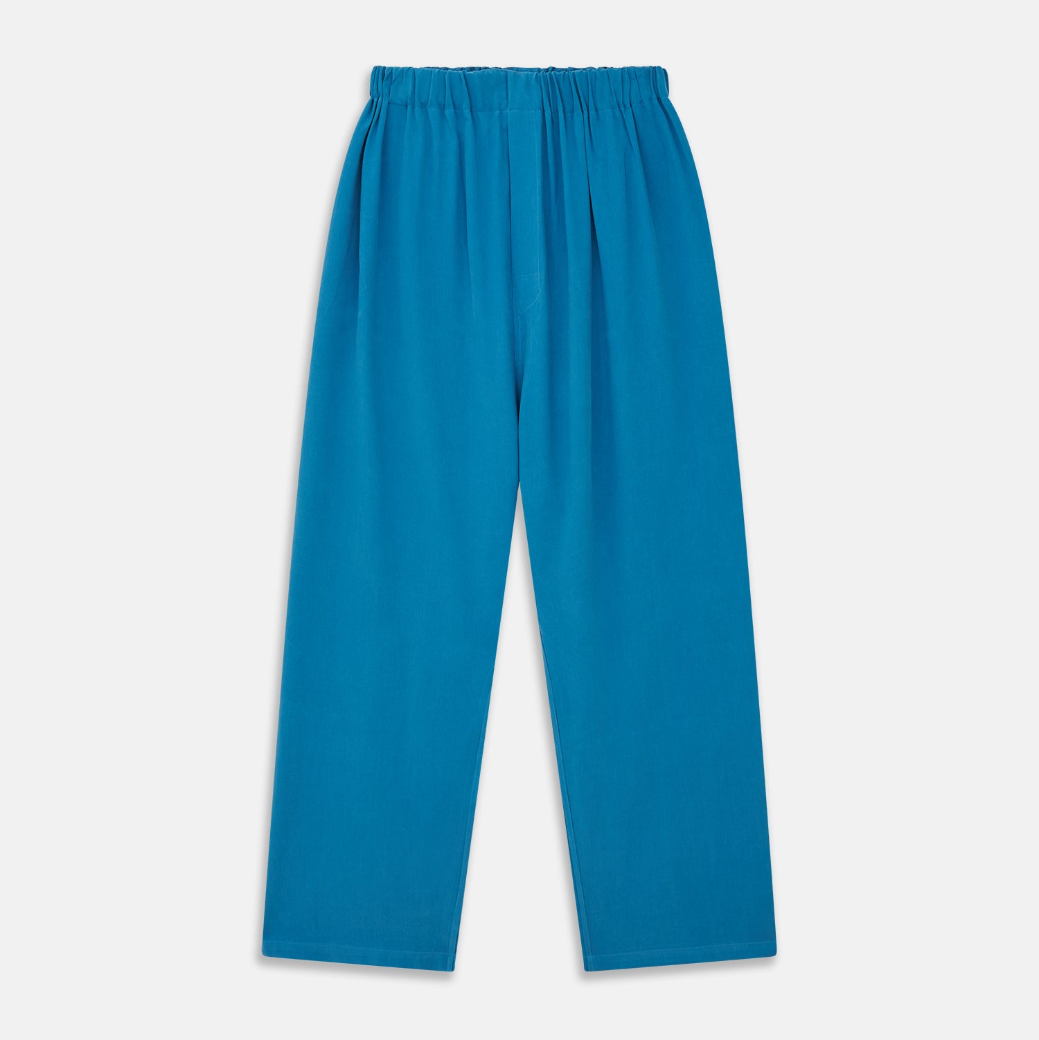 View 5 of product The Turnbull & Asser Blue Silk Hyde Pyjama Set features a modern fit with a long-sleeve button-up top, three pockets, white trim, and elastic-waist pants, all shown on a white background.