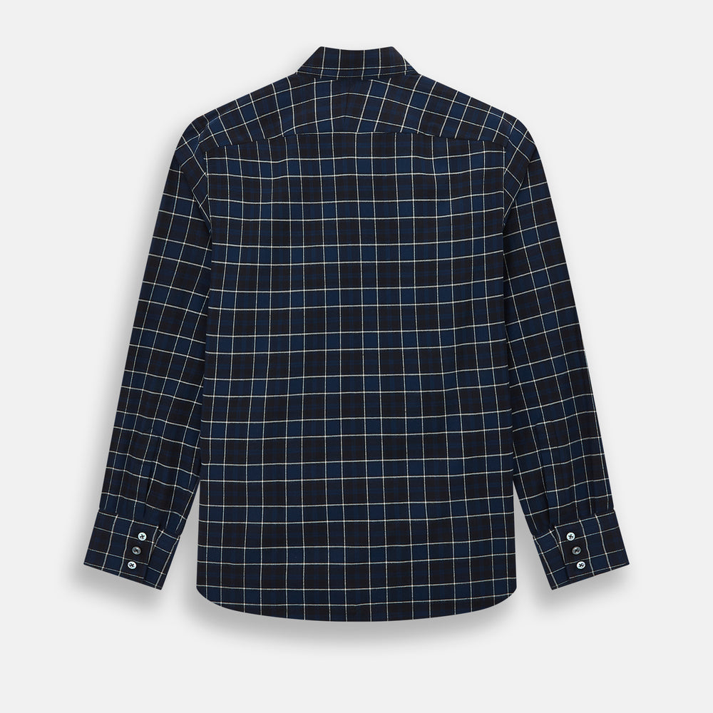 The Turnbull & Asser Navy and White Check Windsor Shirt features a long-sleeve design with a navy base and white check pattern, showcasing British craftsmanship and displayed on a white background.