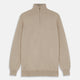 The Beige Lennox Half-Zip Jumper by Turnbull & Asser is a stylish cashmere knit with long sleeves, high collar, and half-length front zipper, finished with ribbed cuffs and hem. Shown against a plain white background.