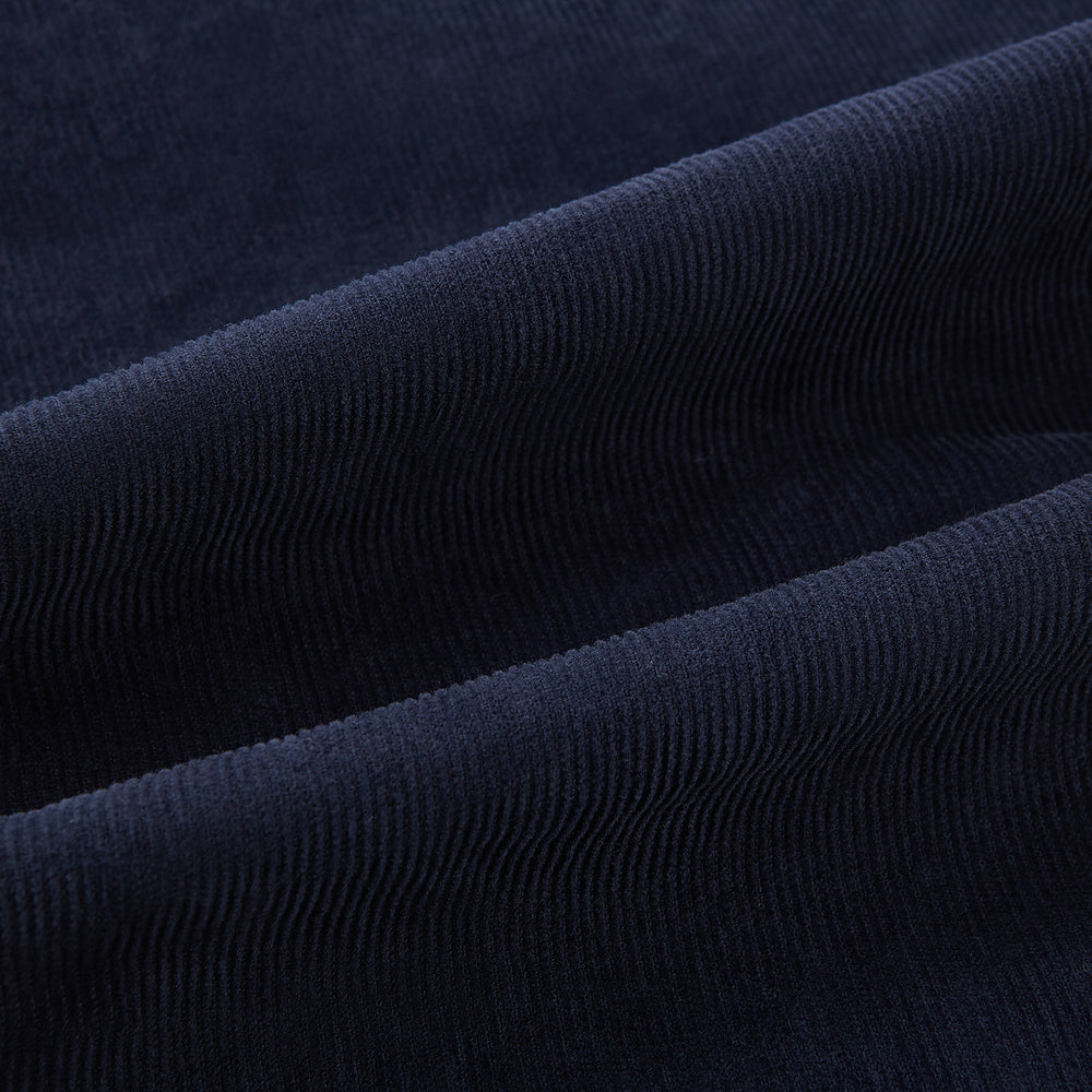 Turnbull & Asser's Light Navy Corduroy Miles Trousers feature a straight-leg stretch fit, elasticated waist, and matching fabric drawstring, shown on a plain white background.
