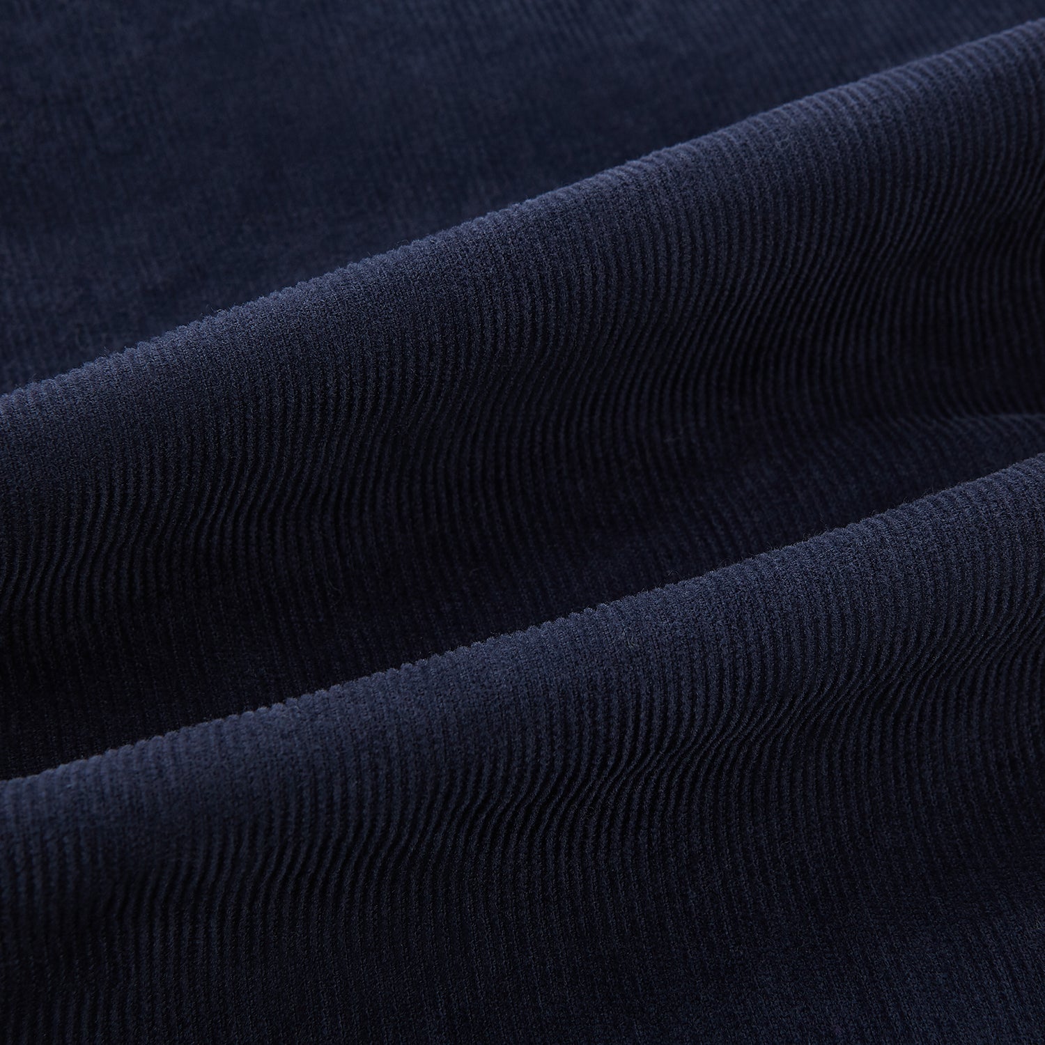 View 7 of product Turnbull & Asser's Light Navy Corduroy Miles Trousers feature a straight-leg stretch fit, elasticated waist, and matching fabric drawstring, shown on a plain white background.